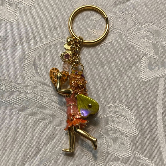 KIRK’S FOLLY gt fairy keychain holding heart with 4 sm. charms.    $25 - Picture 4 of 7